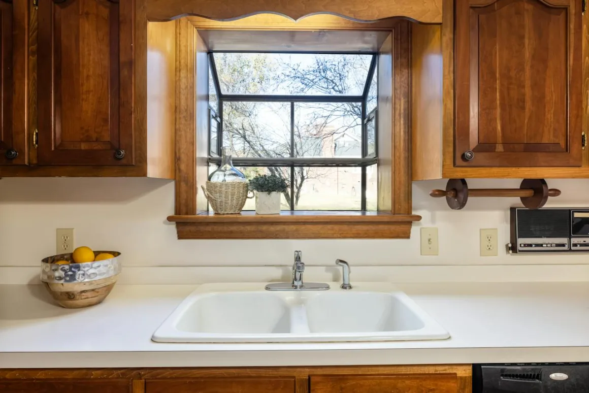 featured image - A Guide to Keeping Your Kitchen Sink Sparkling Clean and Functional