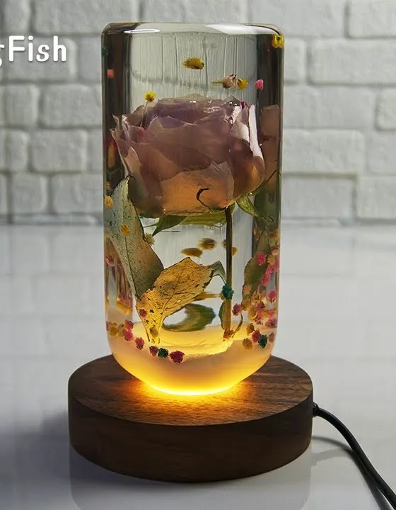 A unique night lamp made with a rose and resin.